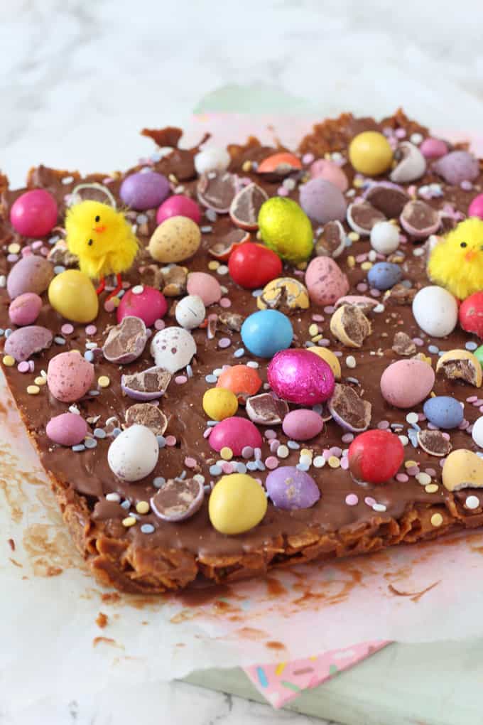 a close up of the Easter Cornflake Crunch Traybake topped with mini eggs