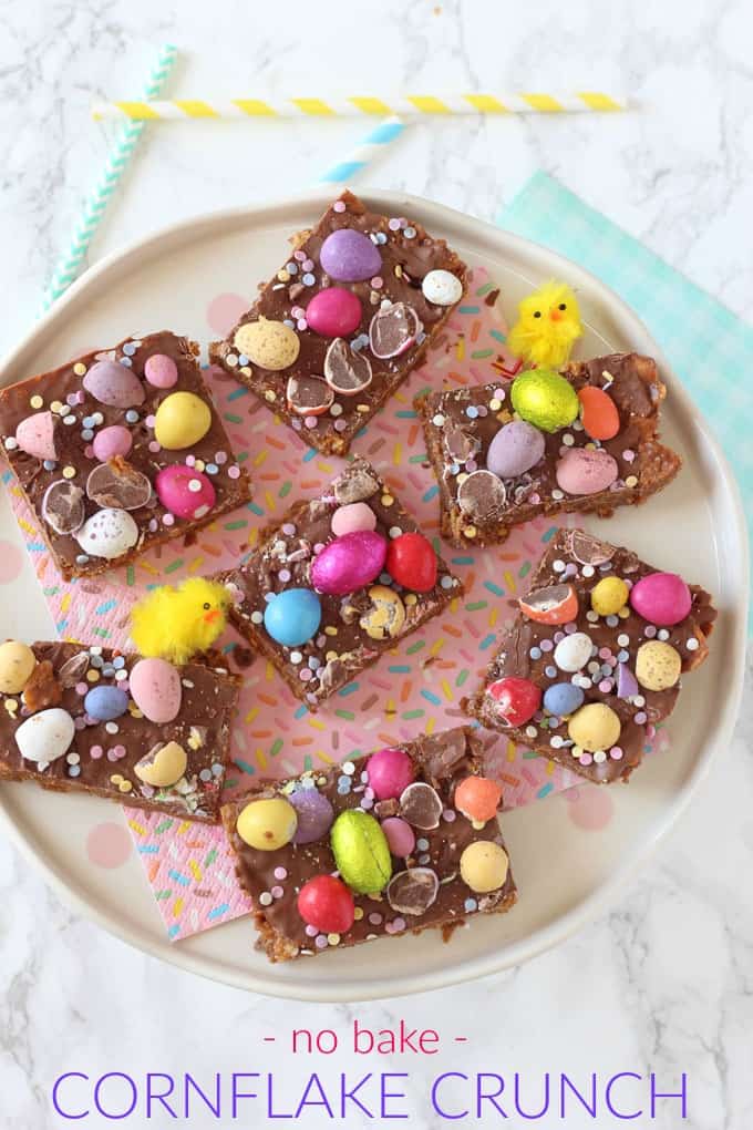 A delicious no-bake Easter delicious made with cornflakes, chocolate and peanut butter and topped with Mini Eggs and Smartie Eggs!