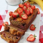 A delicious and easy Strawberry Banana Bread recipe, made a little healthier with no refined sugar. The perfect afternoon snack for hungry kids!