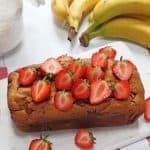 A delicious Strawberry Banana Bread recipe, made a little healthier with no refined sugar. The perfect afternoon snack for hungry kids!