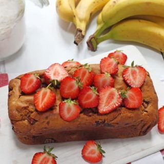 A delicious Strawberry Banana Bread recipe, made a little healthier with no refined sugar. The perfect afternoon snack for hungry kids!