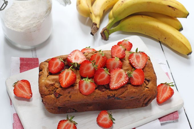 A delicious Strawberry Banana Bread recipe, made a little healthier with no refined sugar. The perfect afternoon snack for hungry kids!