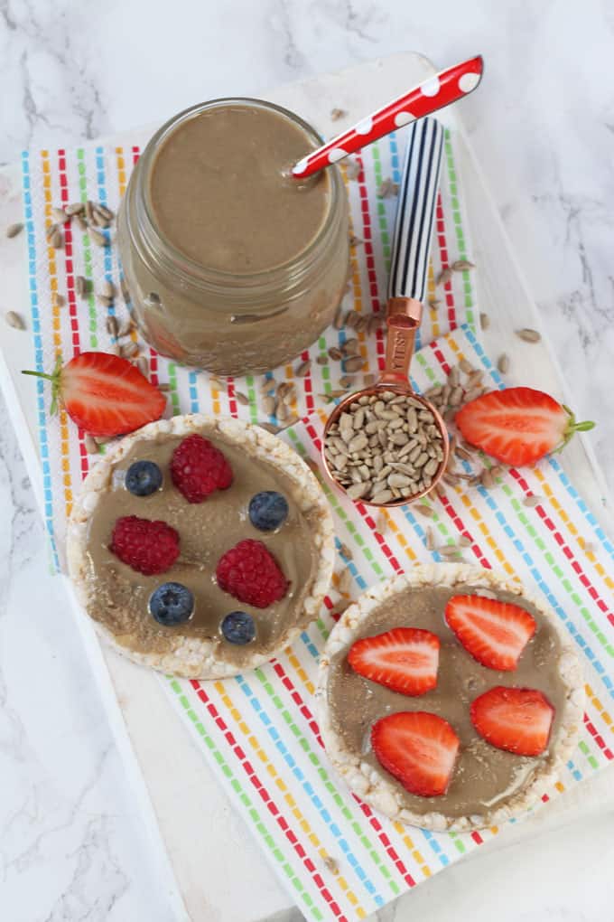 Sunflower Butter served on rice cakes with berries