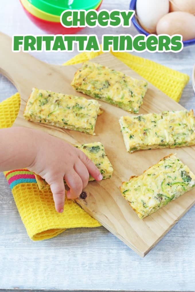Frittata Fingers served on a wooden chopping board.