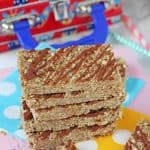 Delicious energy bars made with homemade sunflower butter, oats, flaxseed and coconut. They are the perfect nut-free snack for kids that can be popped into lunch bags or enjoyed as an after school snack!