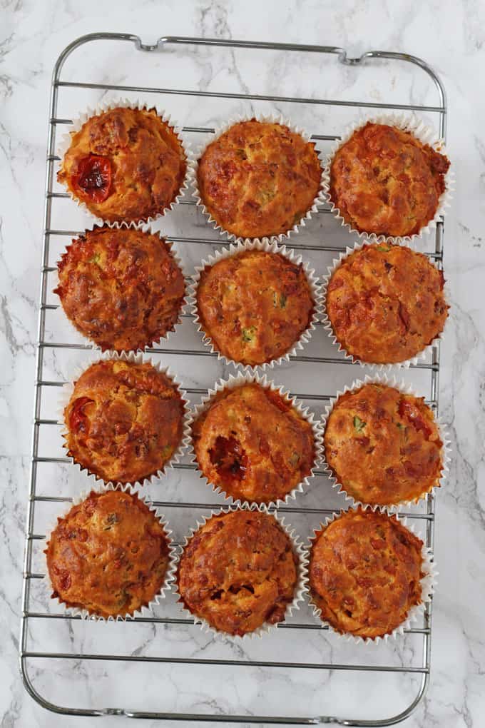 pizza muffins cooling on a wire rack