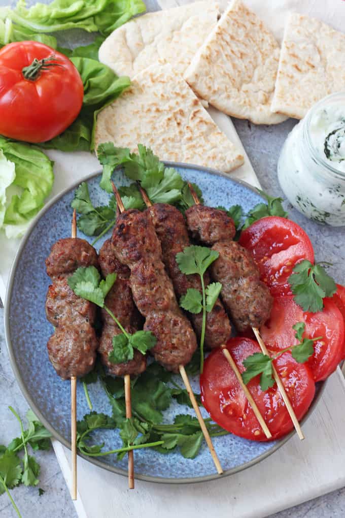 Easy Lamb Koftas served with tomatoes and herbs