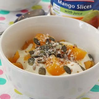 Princes Mango with Juice served with yogurt, seeds and coconut