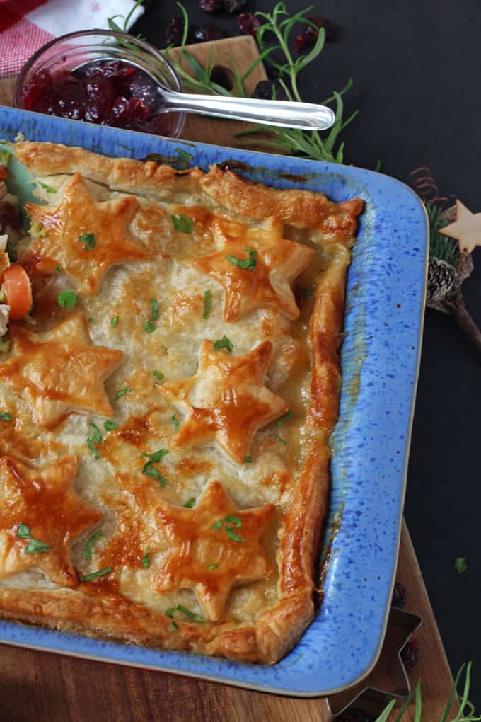 Turkey, Cranberry & Brie Pie in a blue overproof dish.