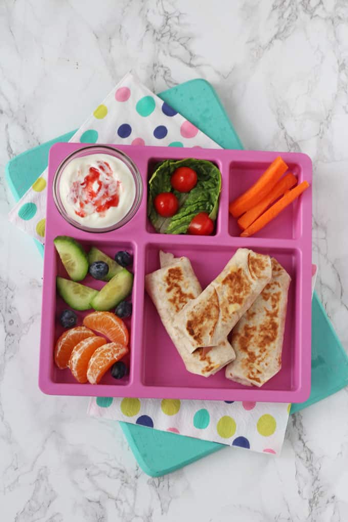 melty ham & cheese wraps served with fruit, vegetables & yoghurt