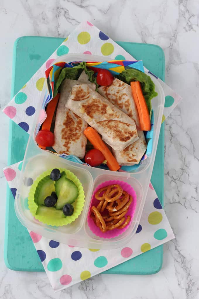 ham & cheese wraps served in a lunchbox