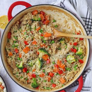 A delicious and easy risotto made with leftover roast chicken and vegetables. This recipe even uses the chicken carcass to make a very tasty stock!