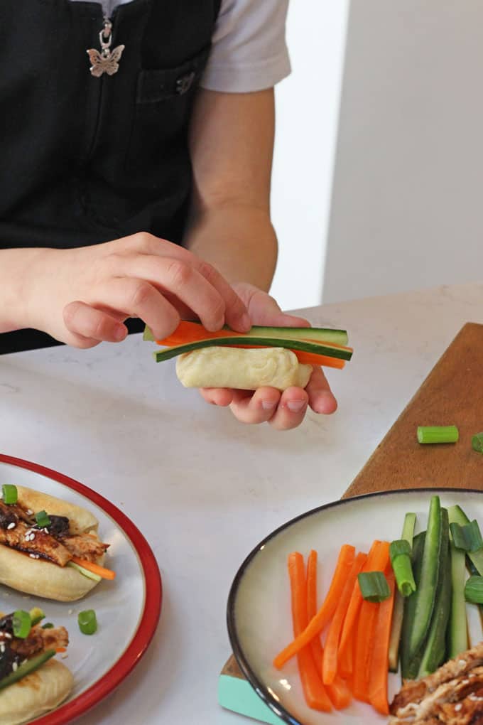 Delicious freshly made steamed buns with a sweet and sticky BBQ chicken sauce made with California Prunes 