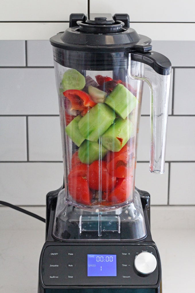 Ingredients for a gazpacho chilled soup in a stand blender