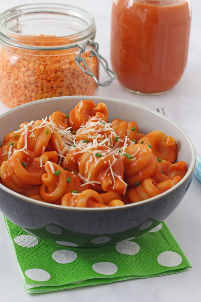 Pasta mixed with red lentil sauce