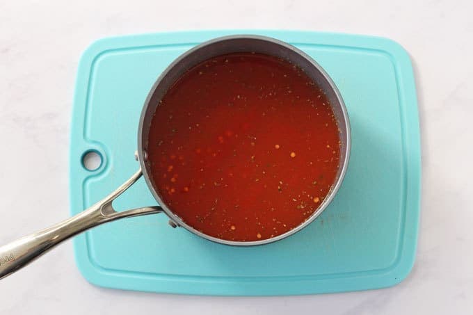 Red lentil sauce in a saucepan