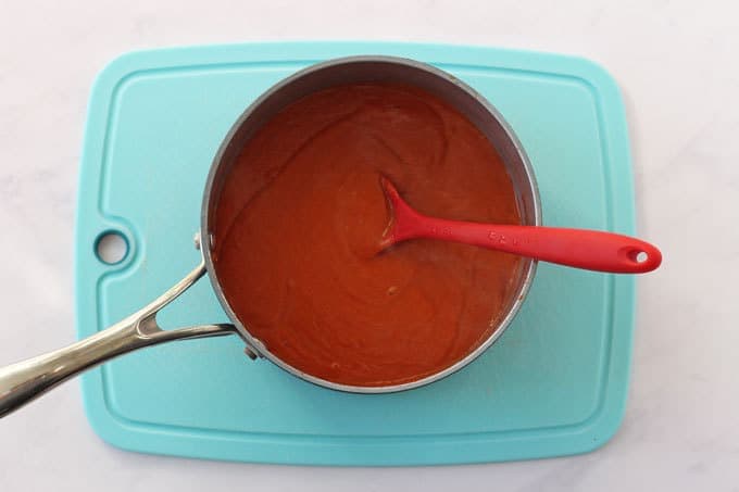 Blended red lentil sauce in a saucepan