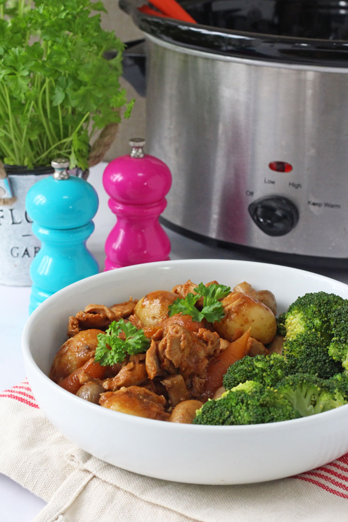 Slow Cooker Chicken Casserole in a bowl with broccoli