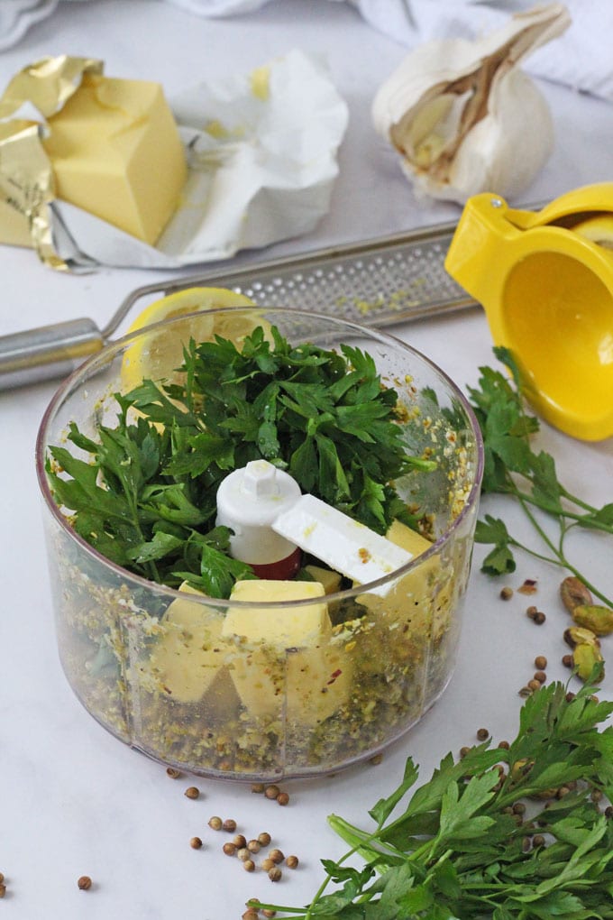 add butter, parsley, lemon juice and zest and a dash of white wine in the mini food processor