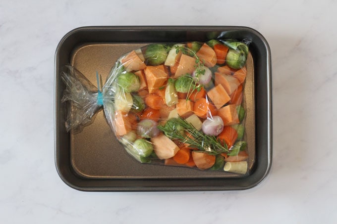 vegetables sealed in an oven bag with herbs