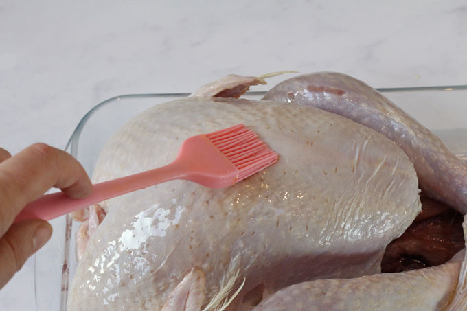 brushing turkey with a little oil
