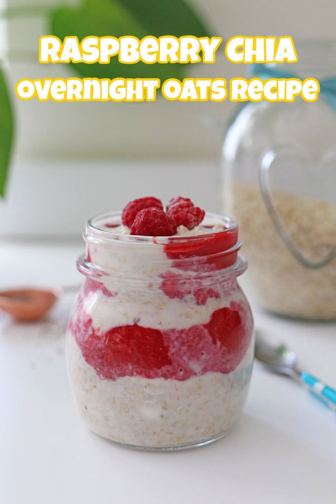 Raspberry Chia Overnight Oats in a small glass jar garnished on top with fresh raspberries.