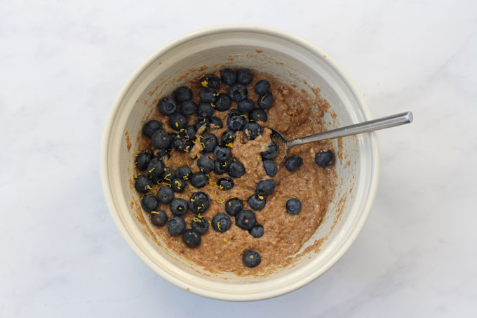 wet ingredients and dry ingredients mixed together in a bowl