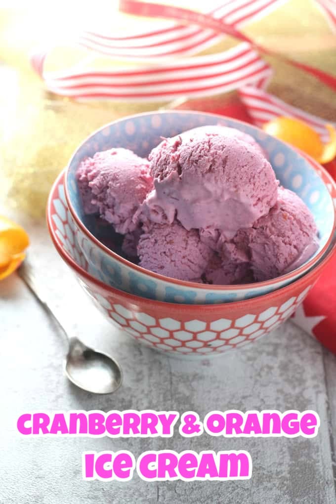 Scoops of cranberry and orange ice cream in a blue and white bowl.