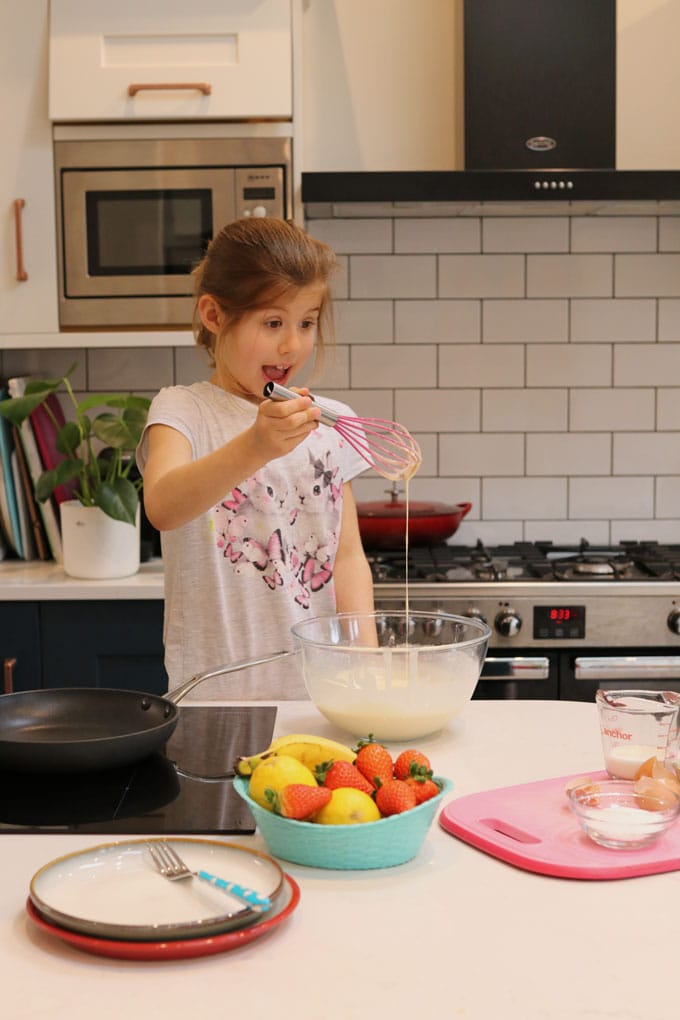 Girl making pancakes