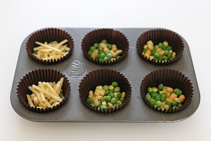 peas, sweetcorn and cheese in muffin cases