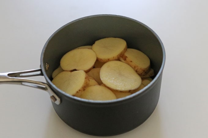 sliced potatoes in pan