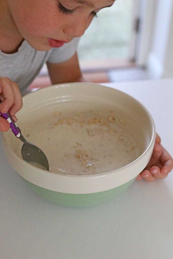 porridge oats, milk and yogurt in a large bowl