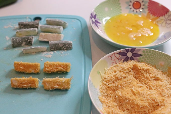 courgette sticks coated in flour, egg and parmesan mixture