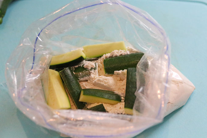 courgettes in a bag with plain flour