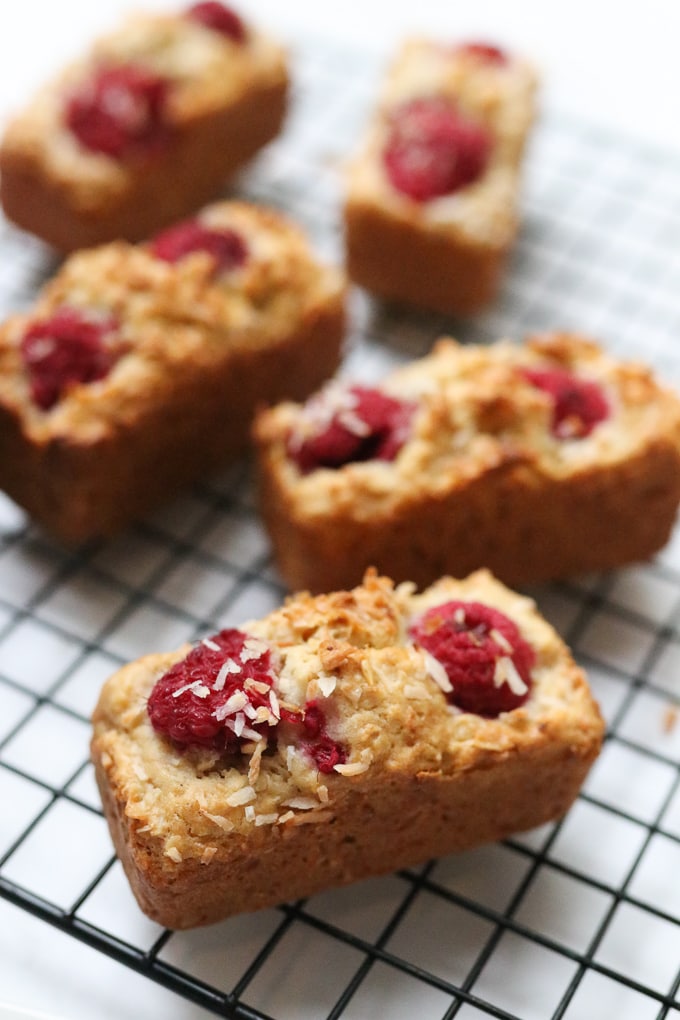 Raspberry & Coconut Mini Loaves on a wire rack