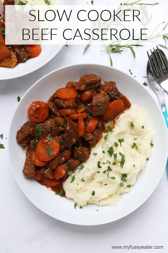 Slow Cooker Beef Casserole served in a white bowl with mashed potato