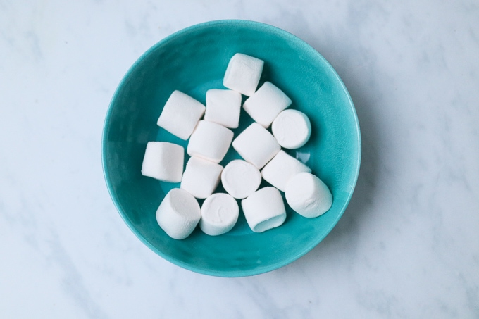 white marshmallows in a blue bowl