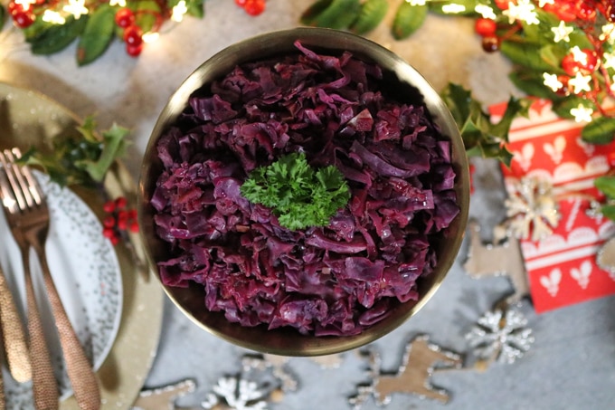 My Fussy Eater Slow Cooker Red Cabbage in a gold bowl on a Christmas themed table