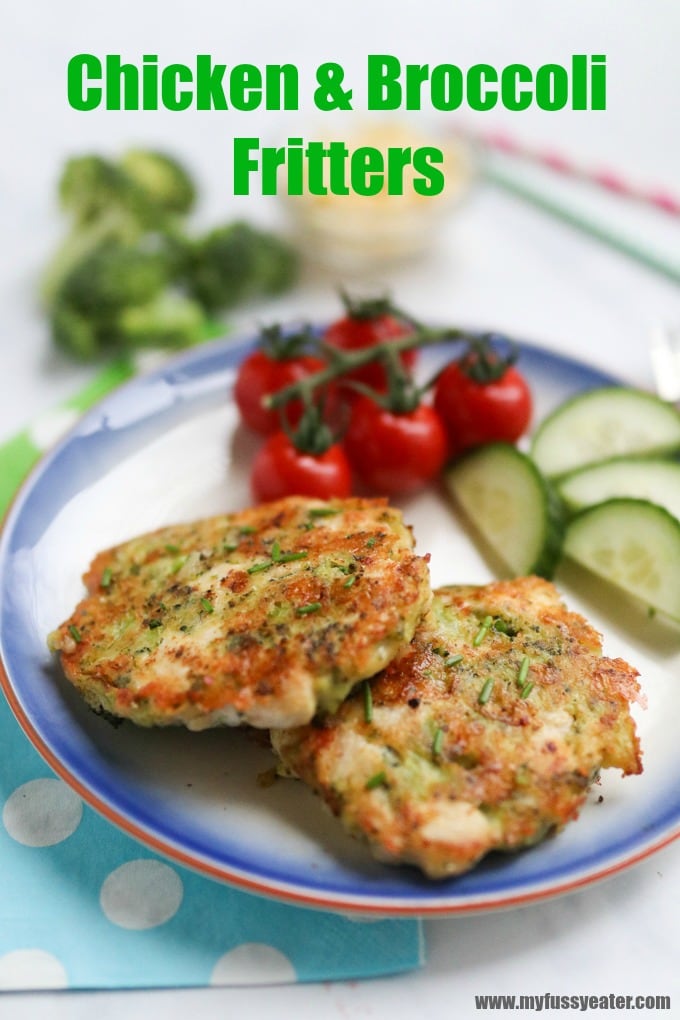 Two Chicken & broccoli fritters served on a dinner plate along with cherry tomato's and sliced cucumber.