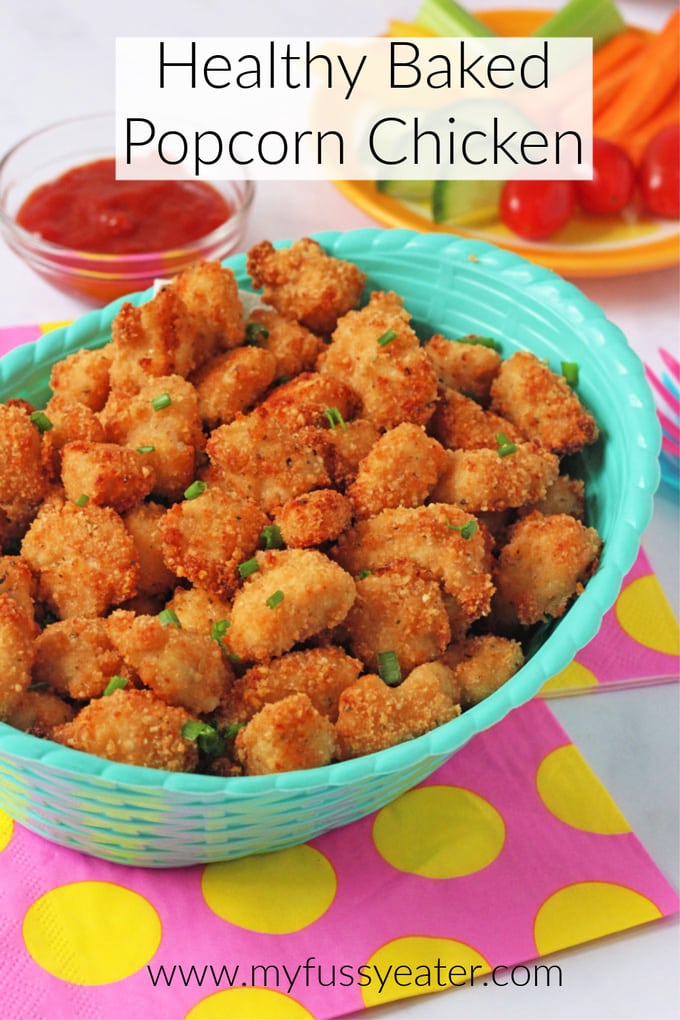 Popcorn chicken served in a light blue basket.