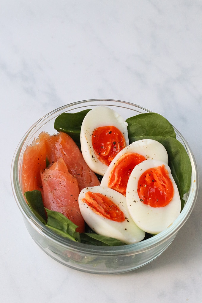 Smoked salmon, eggs and baby spinach with salt and pepper
