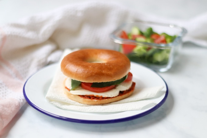 Pesto Caprese Bagel with side salad