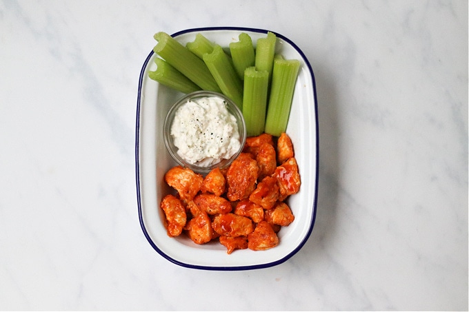 buffalo chicken served with celery and blue cheese dip