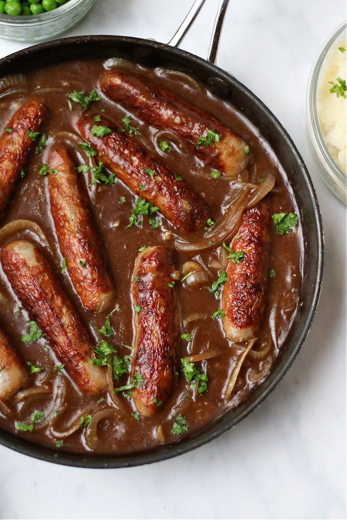 sausages in onion gravy in the pan