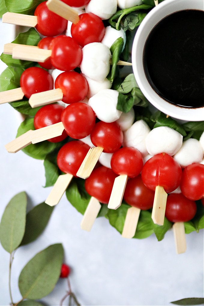 a close up of the caprese skewers