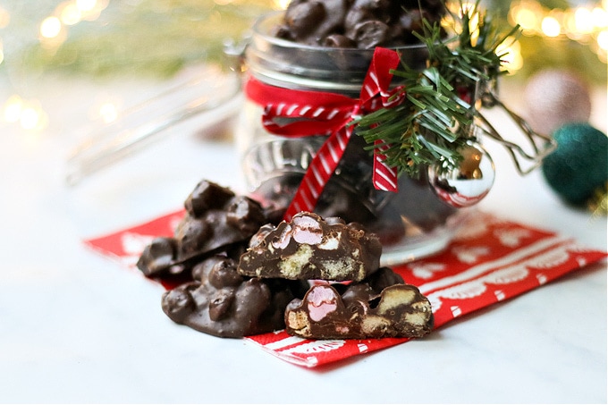 Rocky Road Bites in a mason jar decorated with festive ribbon and christmas decorations