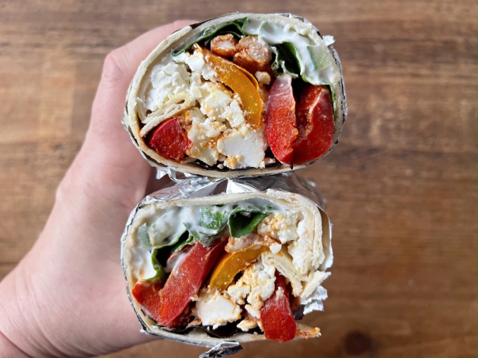 greek turkey wrap sliced in half