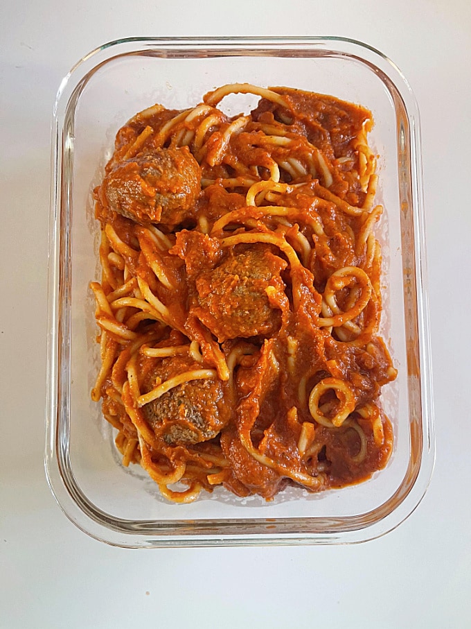 leftover spaghetti meatballs in a glass container