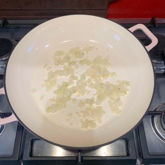 chopped onions in a pan on the hob