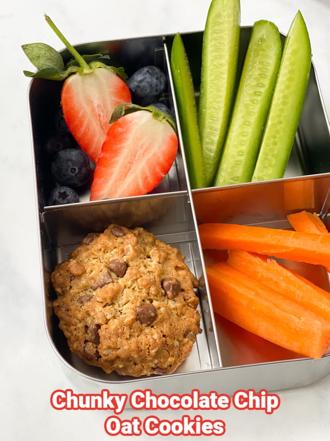 Summer Snacks For Kids - A Chocolate Chip Oat cookie in stainless steel compartment lunch box with fruit and veg